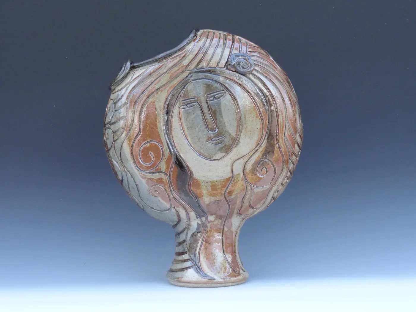Face Pedestal Vase